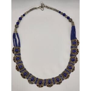 Tibetan-style handcrafted necklace from Nepal features vibrant lapis lazuli
